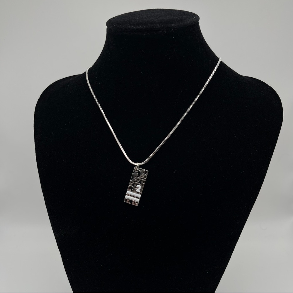 CHRISTIAN DIOR VINTAGE SILVER-TONE OBLIQUE / TROTTER PENDANT NECKLACE